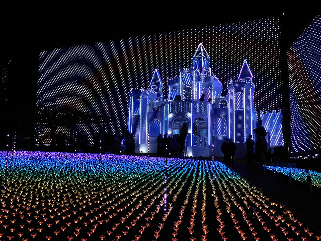 Ashikaga Flower Park - Illuminated castle and rainbow light fields at the Flower Fantasy illumination