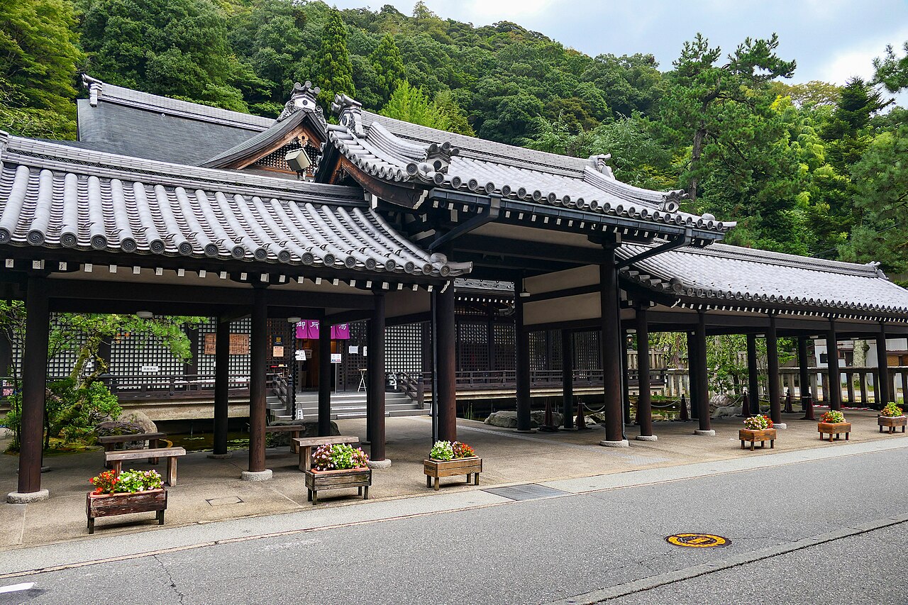 Gosho-no-yu - Grand bathhouse with a temple-style gate and arched bridge in Kinosaki Onsen