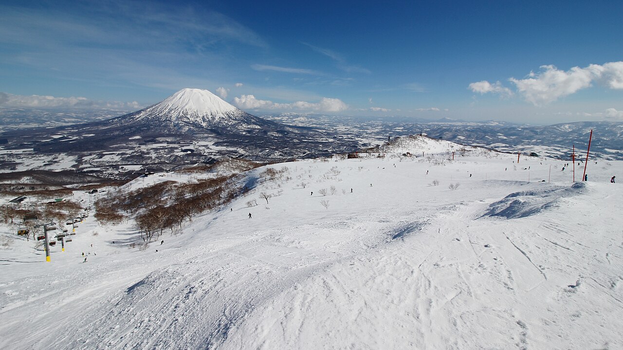 Niseko - Mount Yotei seen across a groomed run at Niseko Annupuri in winter